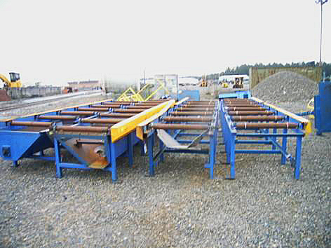 Used Wheelabrator/BCP 4 wheel roll conveyor machine
